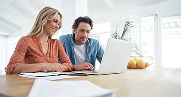 Couple looking at computer